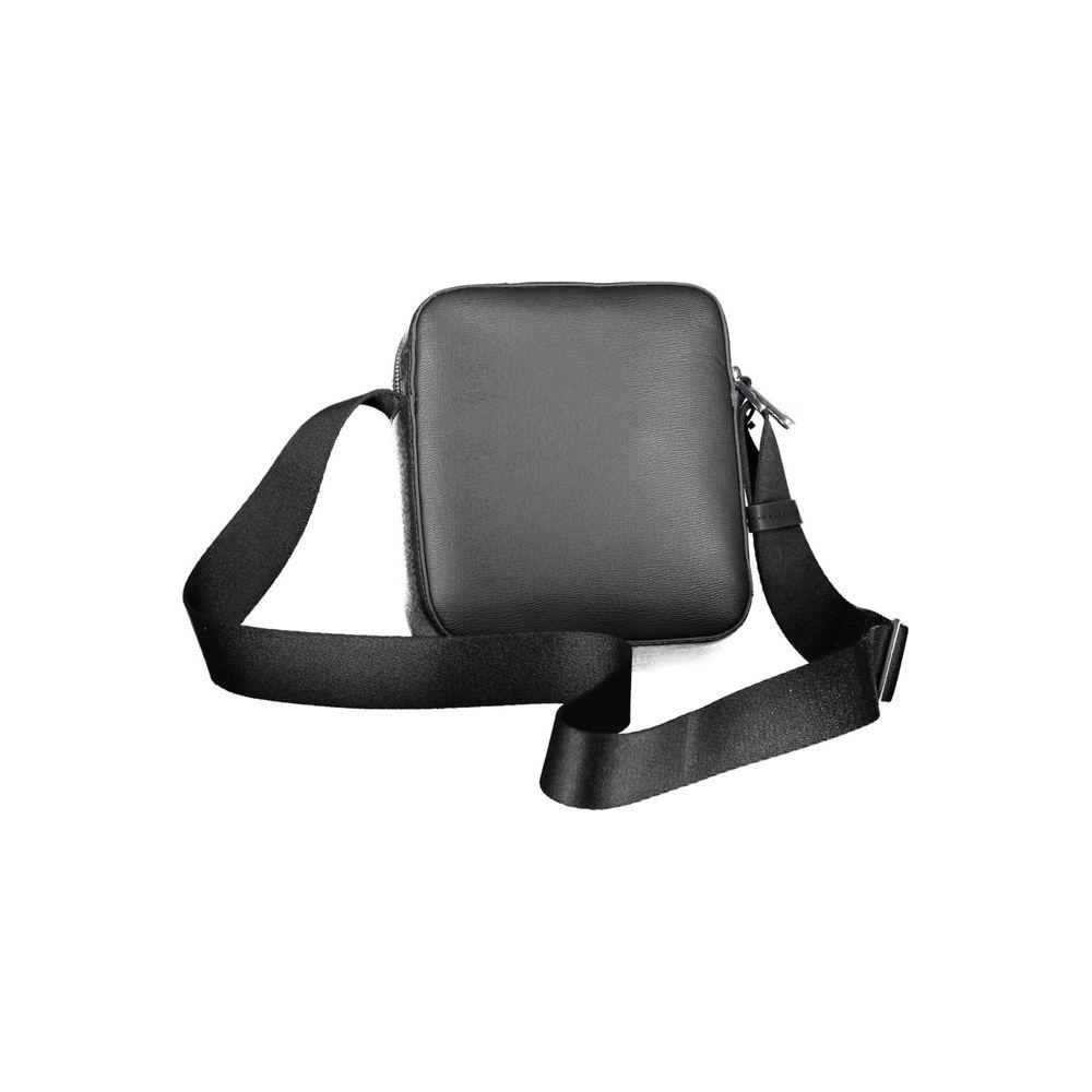 Calvin Klein black polyester men's shoulder bag with adjustable strap and inner pocket. Stylish and functional design.