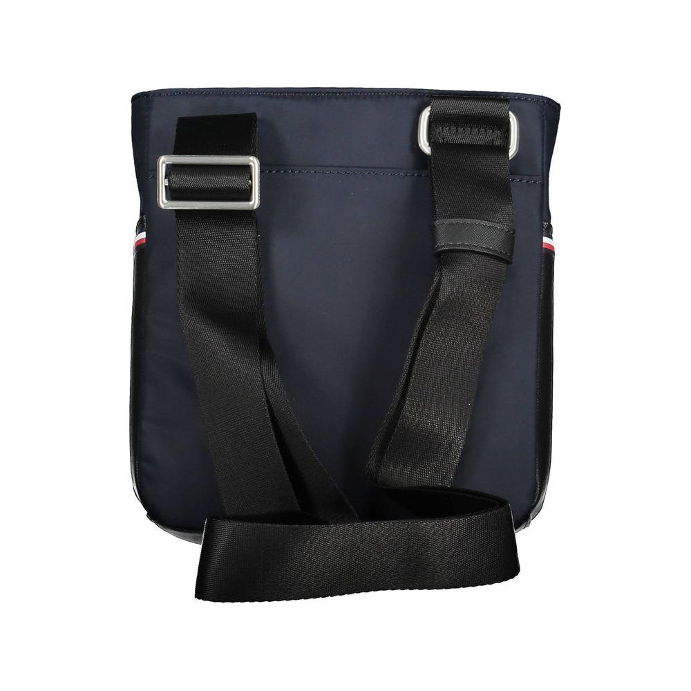 Tommy Hilfiger blue polyester men's shoulder bag with adjustable strap and external pockets for stylish functionality.