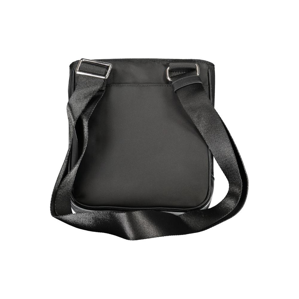 Tommy Hilfiger black polyester shoulder bag with adjustable strap, featuring external and internal pockets, and zip closure.