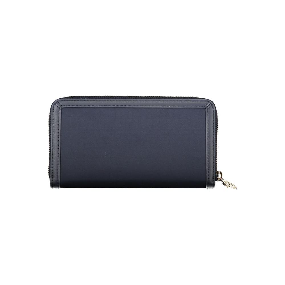 Tommy Hilfiger Chic Sustainable Blue Wallet with Secure Zip, made from recycled polyester with iconic logo and multiple compartments.