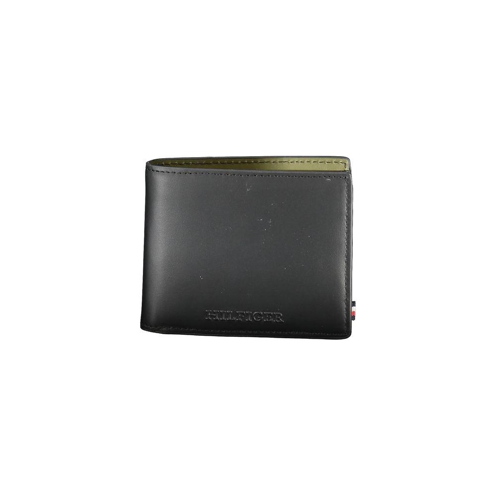 Tommy Hilfiger black leather wallet with double card spaces and contrasting details, featuring embossed logo design.