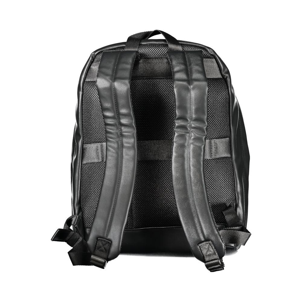 Back view of Tommy Hilfiger black backpack with adjustable shoulder straps and padded back support for comfort and style.