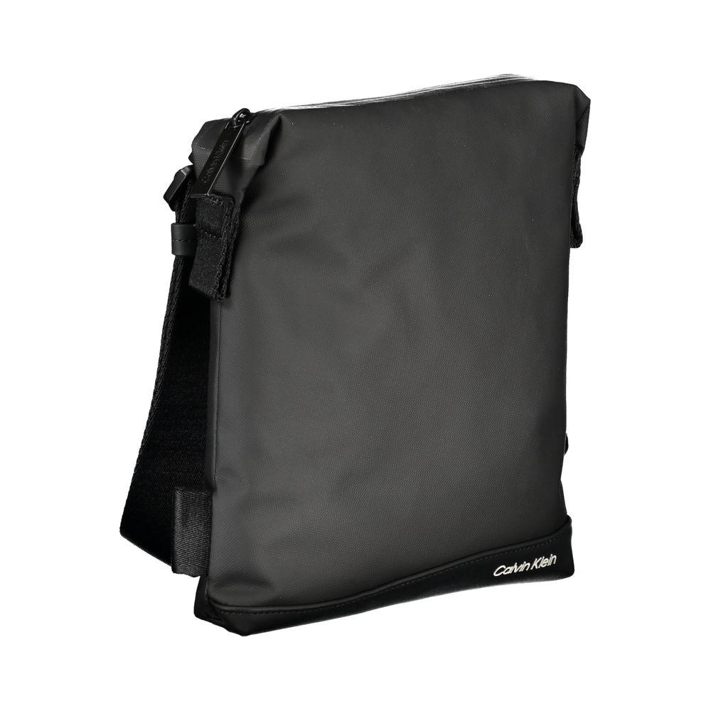 Calvin Klein elegant black shoulder bag with contrast details and adjustable strap for a sophisticated look.