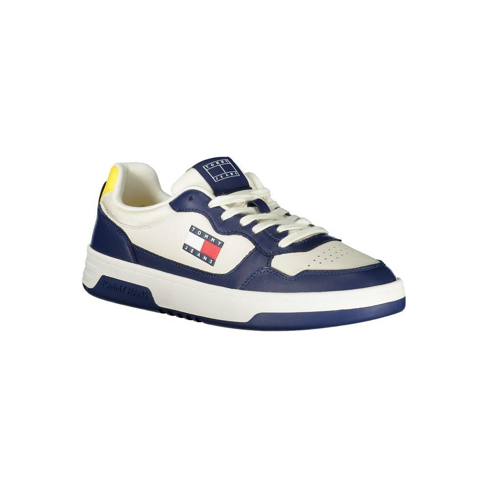 Men's blue Tommy Hilfiger sneakers with white and yellow accents, featuring a logo and removable insole for personalized comfort.