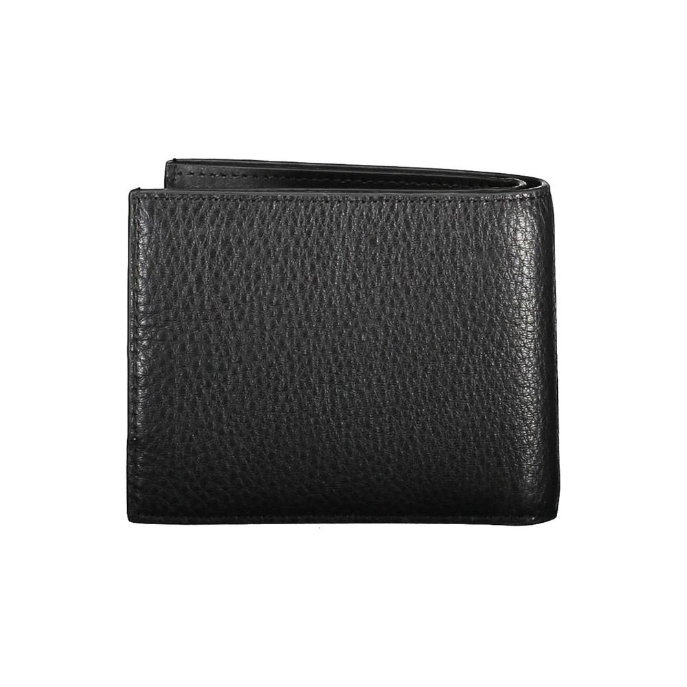Calvin Klein black leather men's wallet with RFID protection, featuring multiple card slots and a zip coin purse for modern luxury.