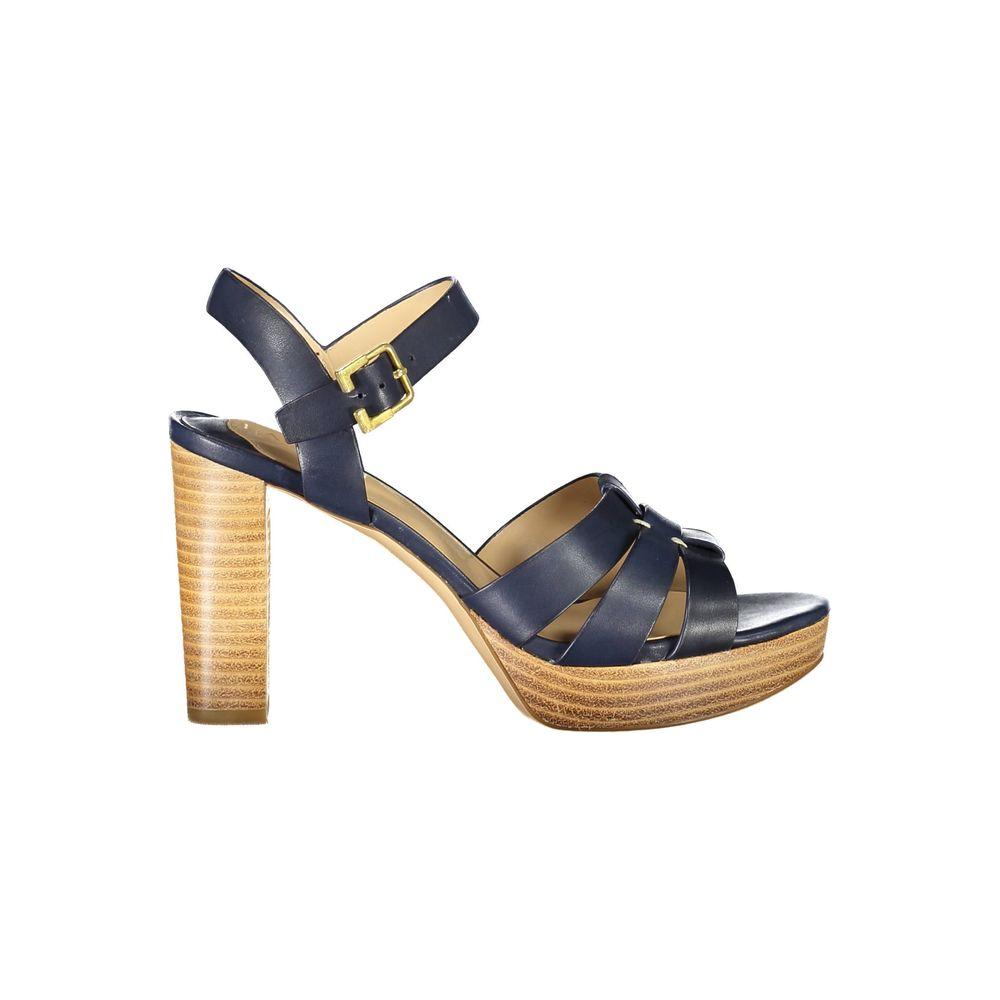Ralph Lauren blue leather sandal with 10cm heel, ankle strap, and logo detail. High heel sandal with contrasting elements.