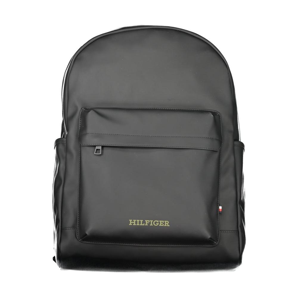 Tommy Hilfiger black polyester backpack with multiple pockets and zip closure, featuring logo print and adjustable straps, eco-friendly material.
