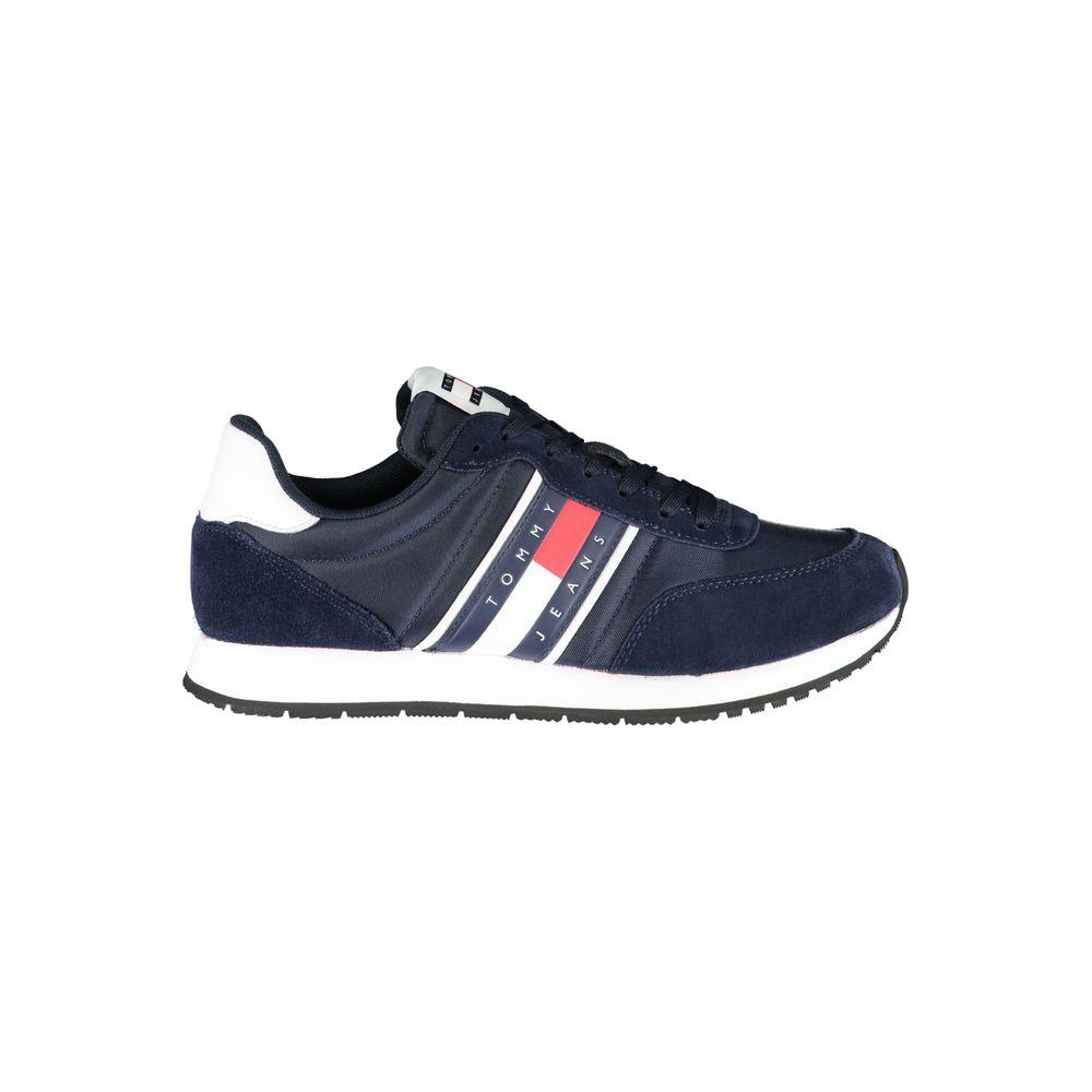 Tommy Hilfiger blue sneaker with laces, logo, contrast details, made of 50% recycled polyester, side view.