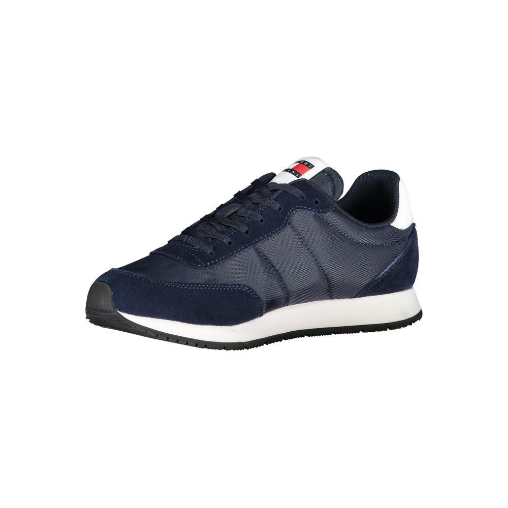 Tommy Hilfiger blue polyester sneaker with laces, contrast details, logo, made from 50% recycled materials, side view.