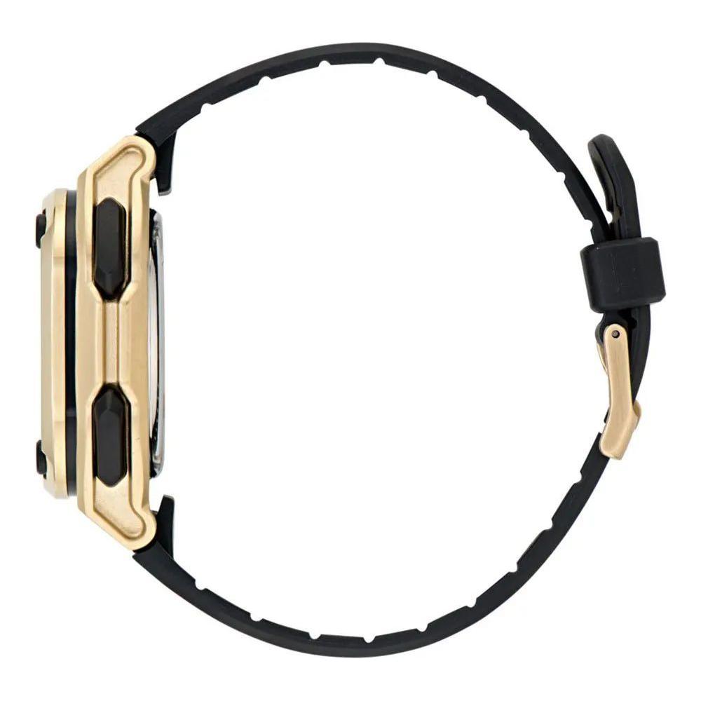 Side view of Adidas black synthetic watch with golden stainless steel case, silicone bracelet, and buckle clasp.