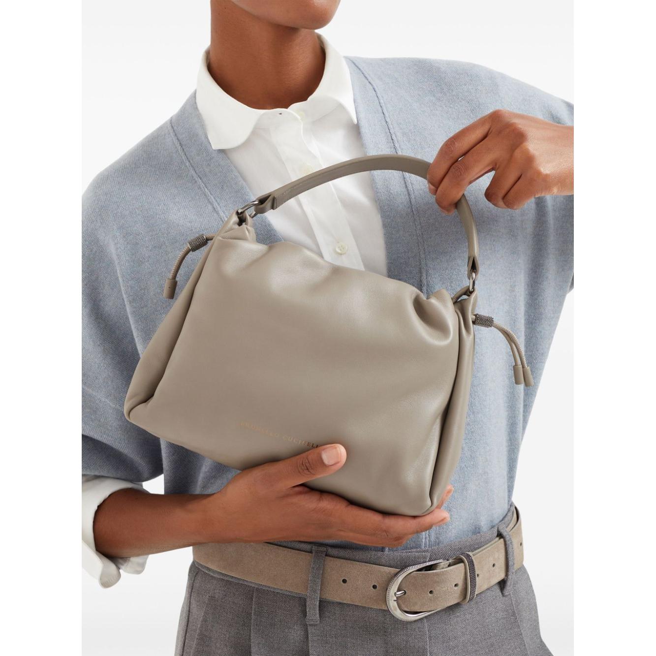 Front view with bag zipped and handles upright.