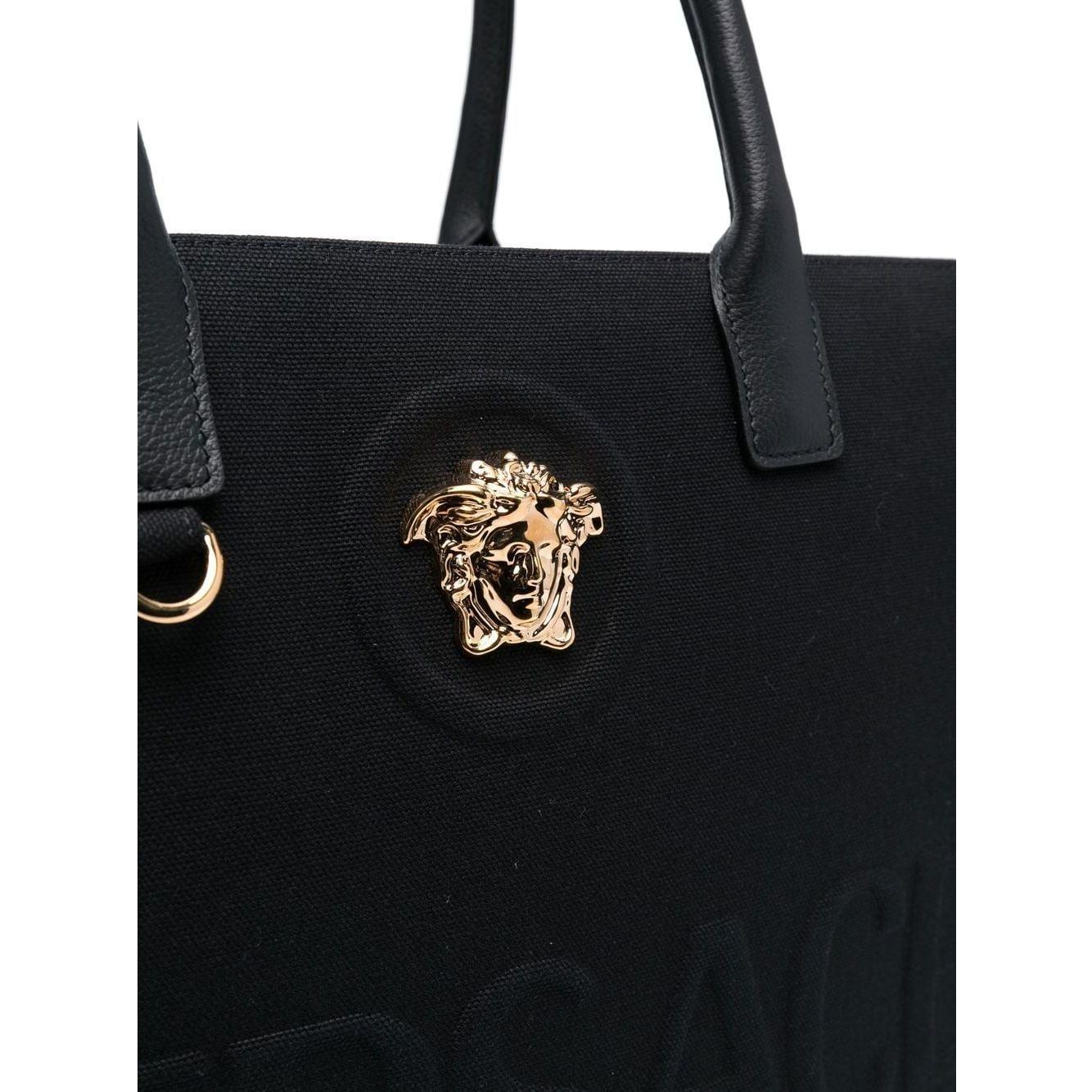 Front view with bag zipped and handles upright.