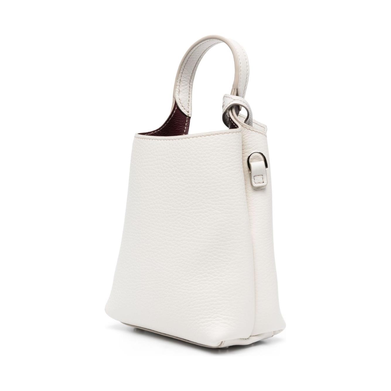 Front view with bag zipped and handles upright.