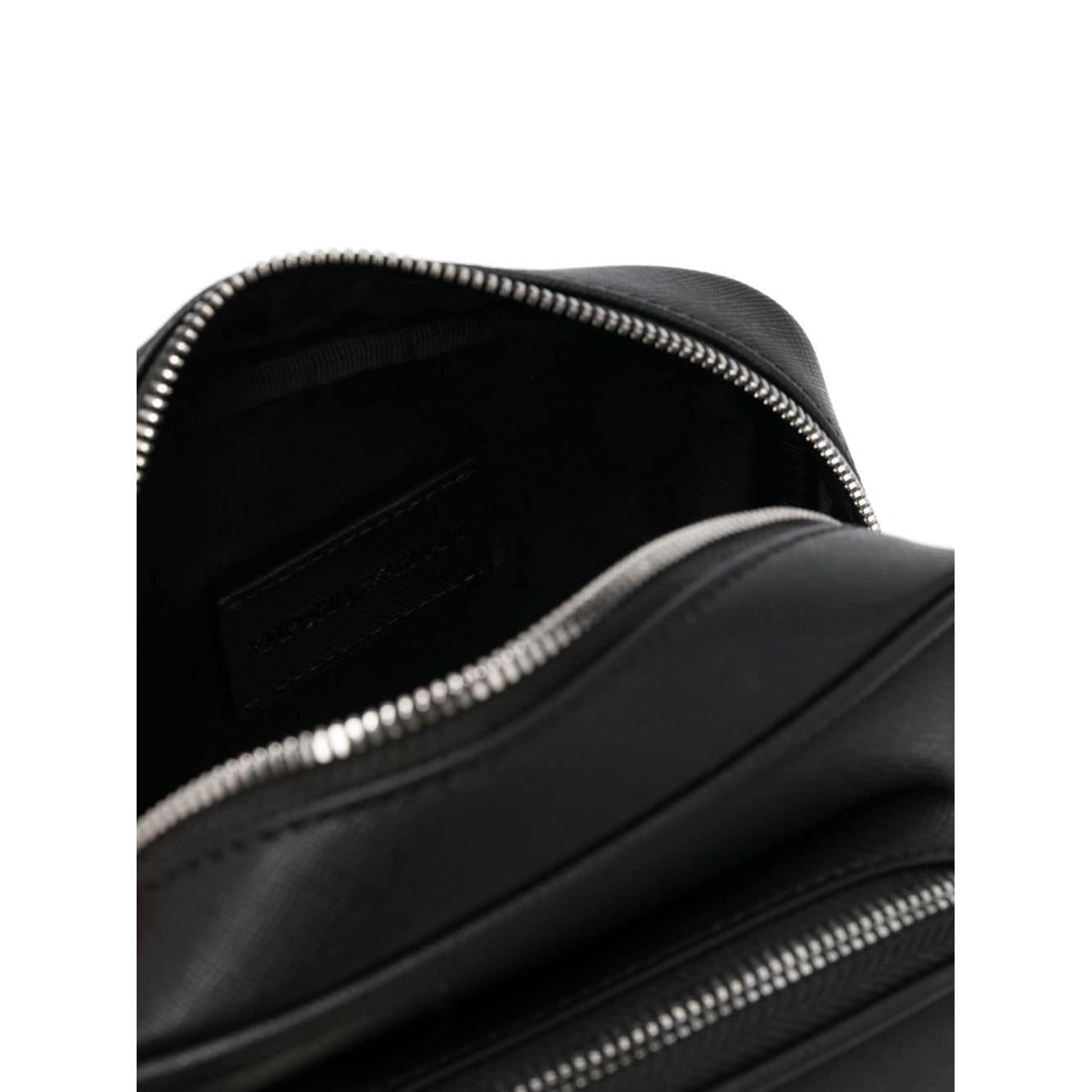 Front view with bag zipped and handles upright.