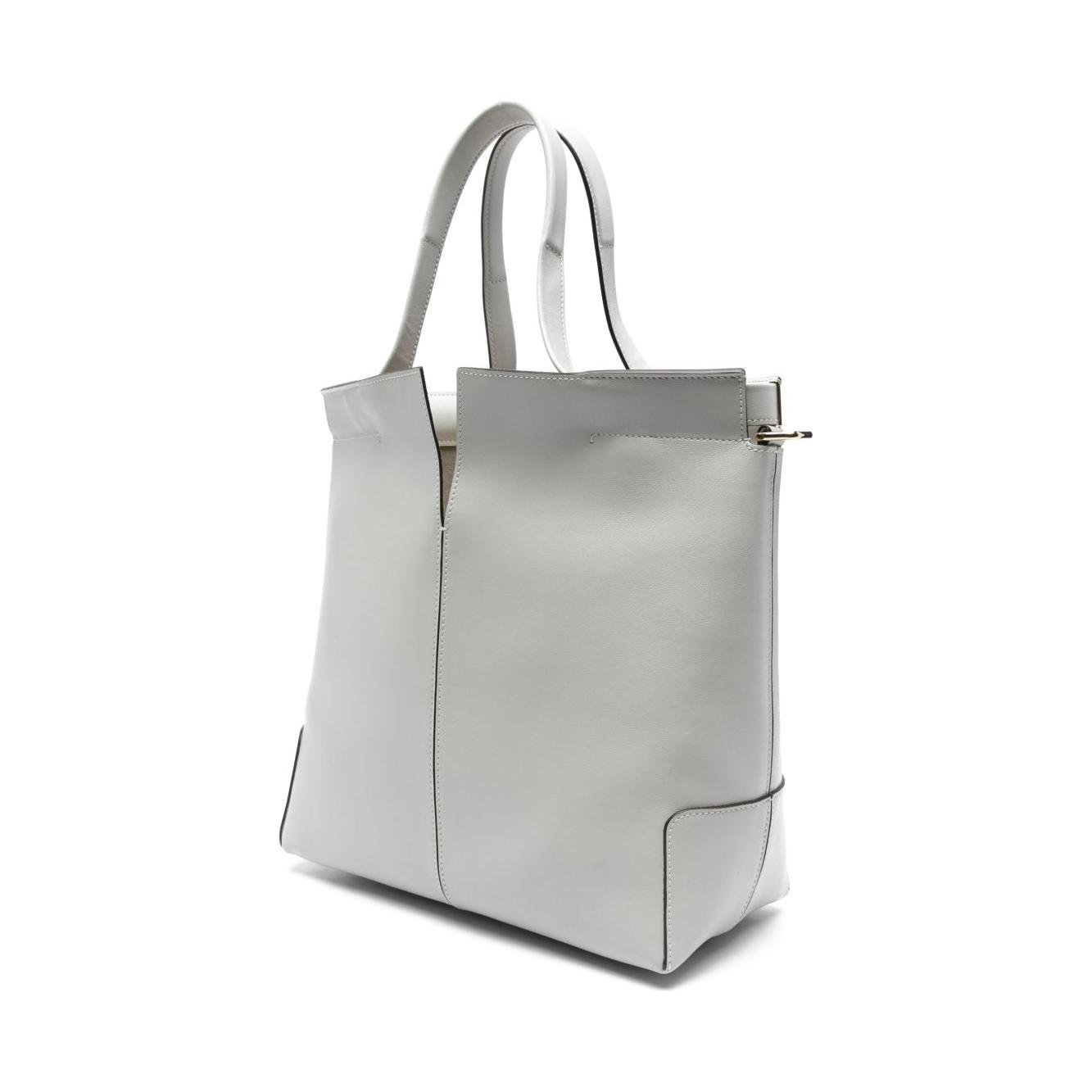 Front view with bag zipped and handles upright.