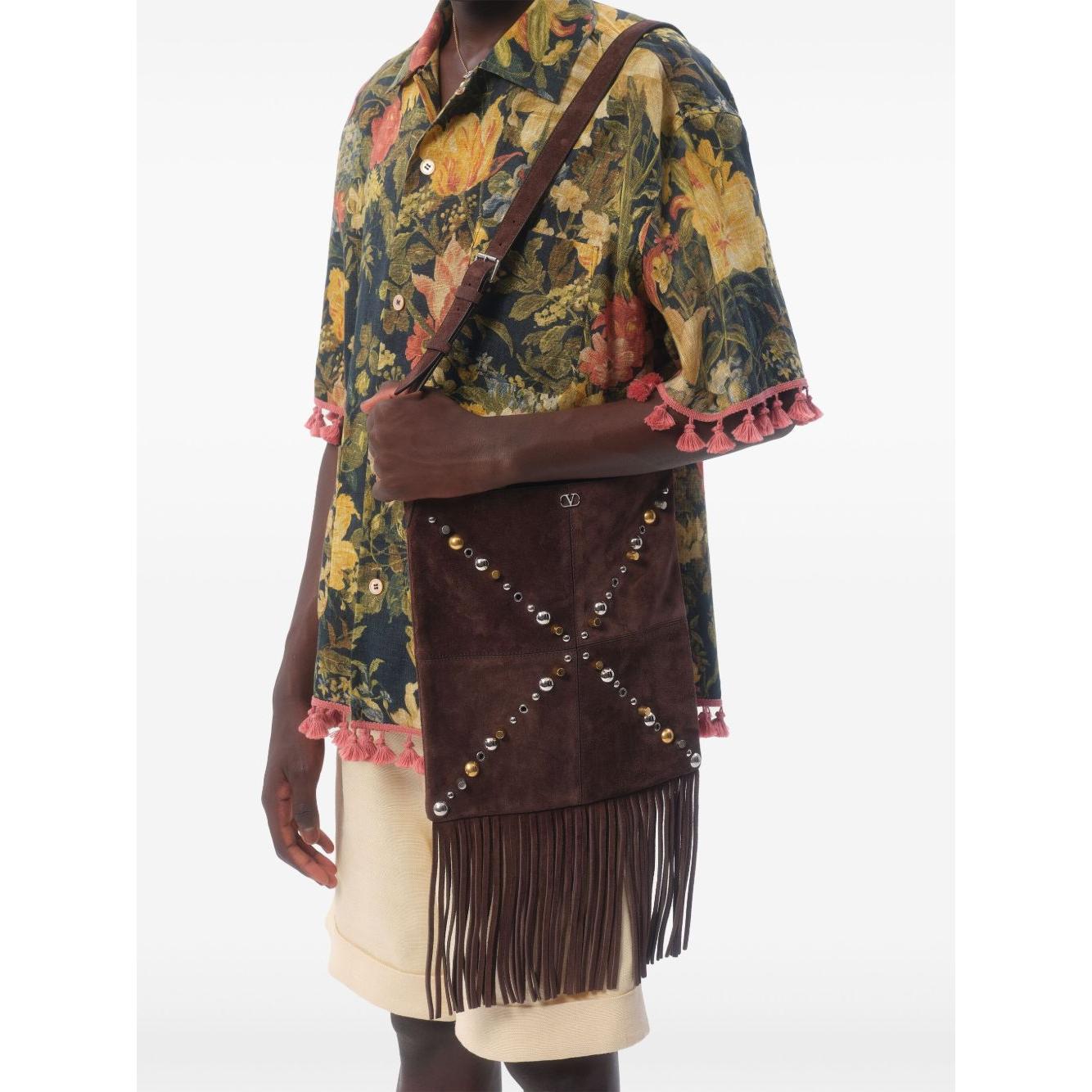 Front view with bag zipped and handles upright.