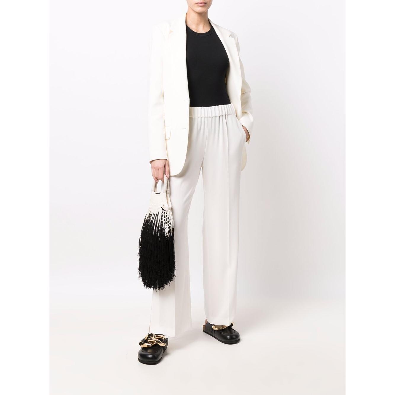 Front view with bag zipped and handles upright.