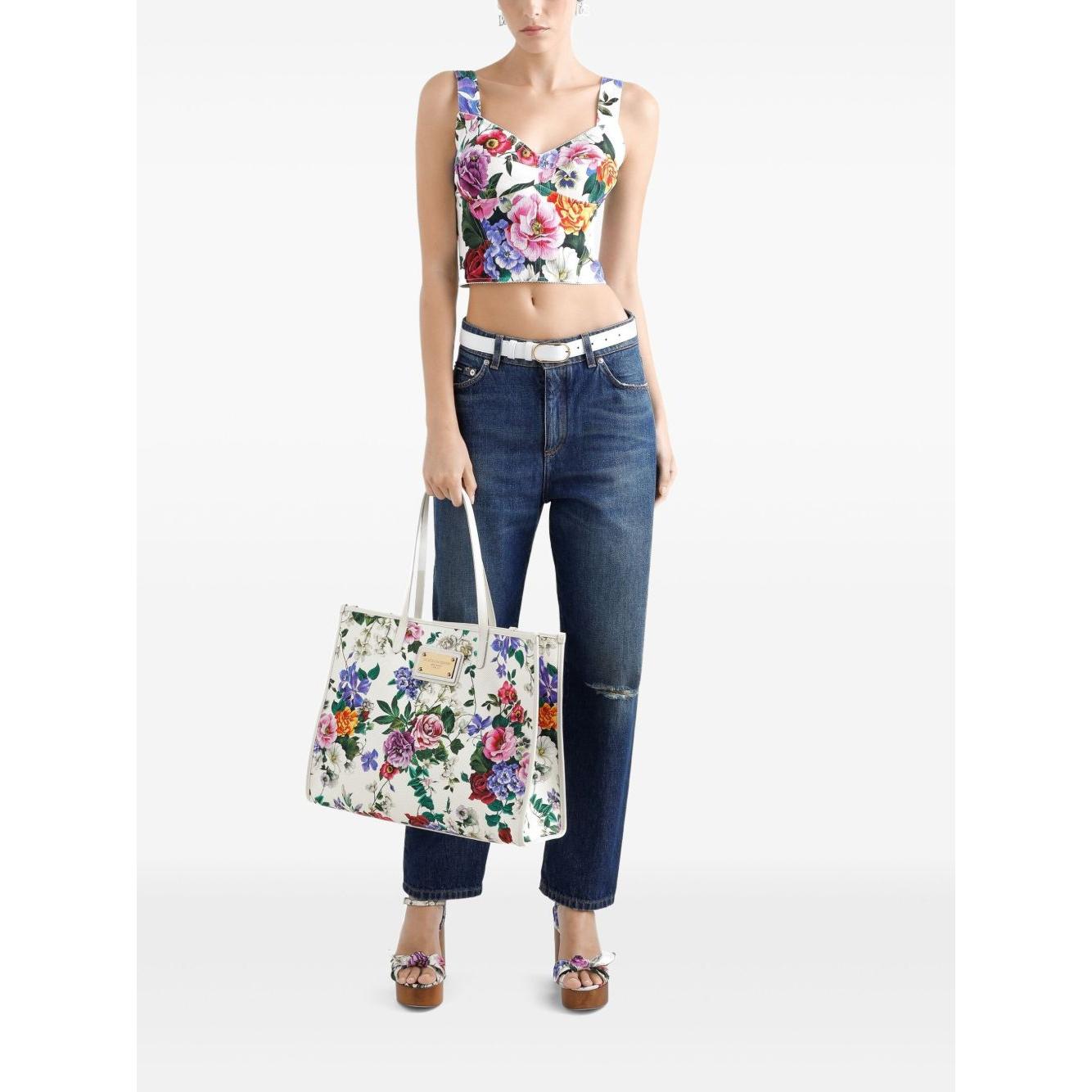 Front view with bag zipped and handles upright.