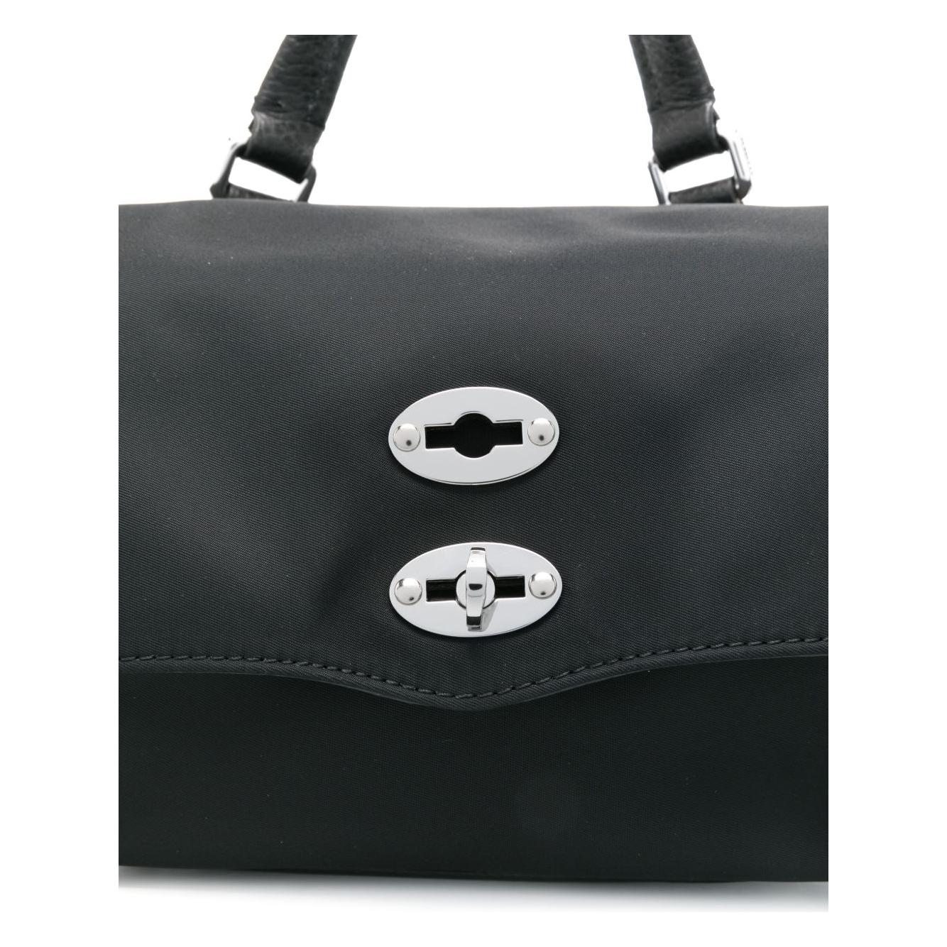 Front view with bag zipped and handles upright.