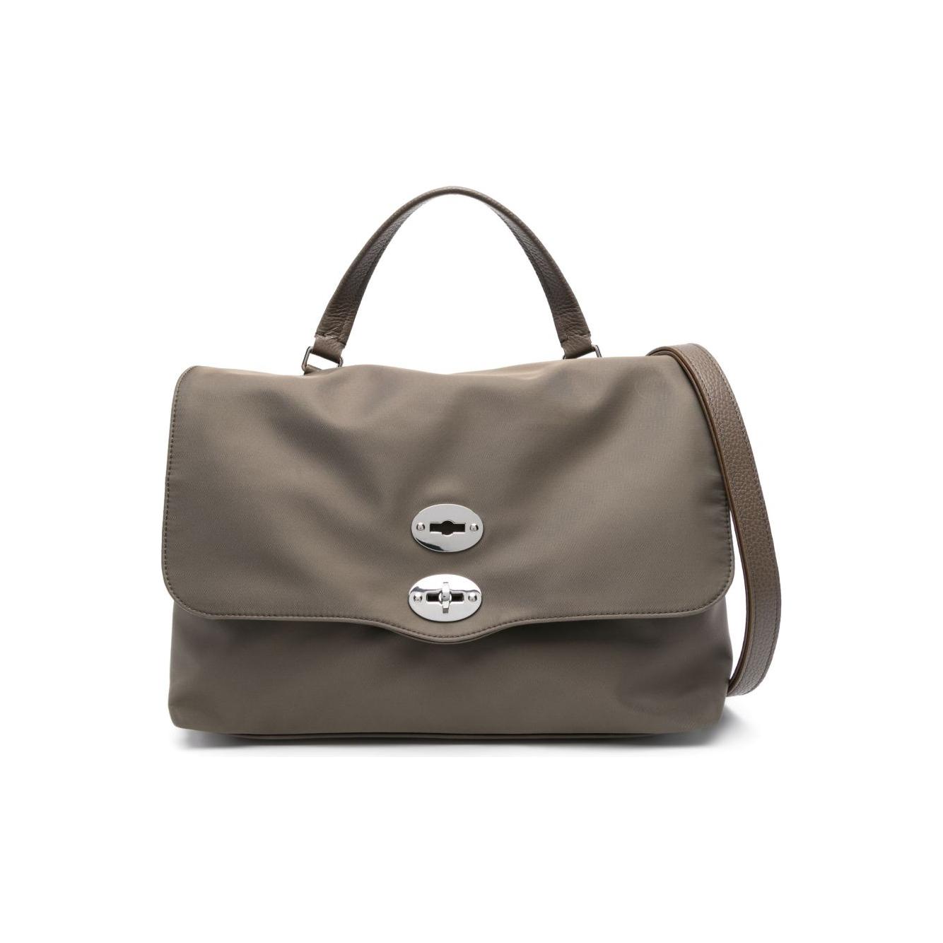 Front view with bag zipped and handles upright.