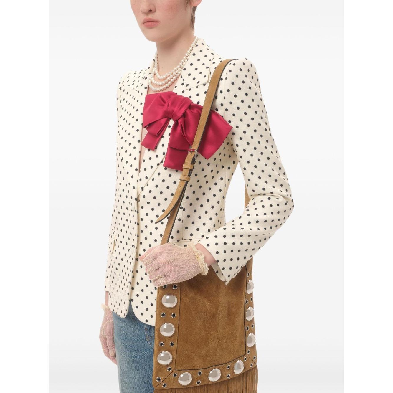Front view with bag zipped and handles upright.