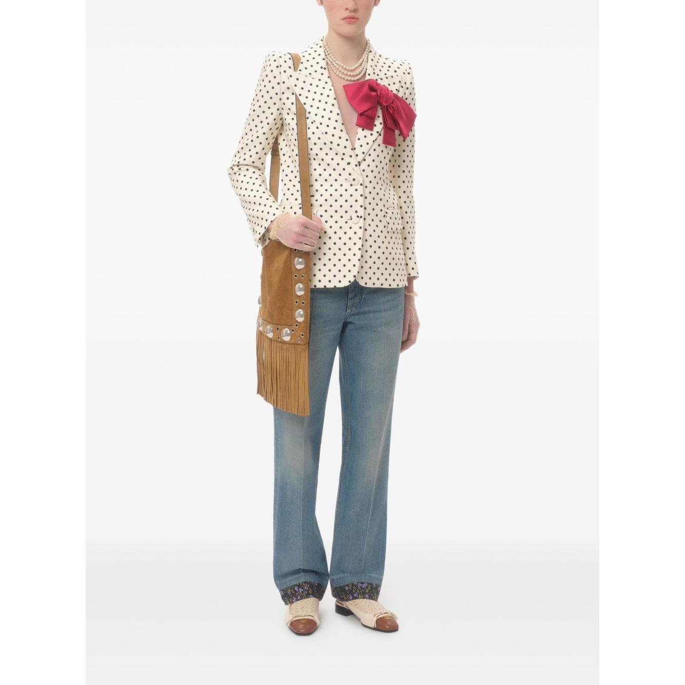 Front view with bag zipped and handles upright.