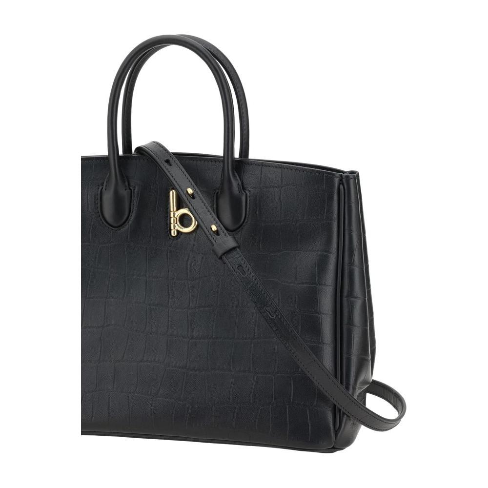Front view with bag zipped and handles upright.