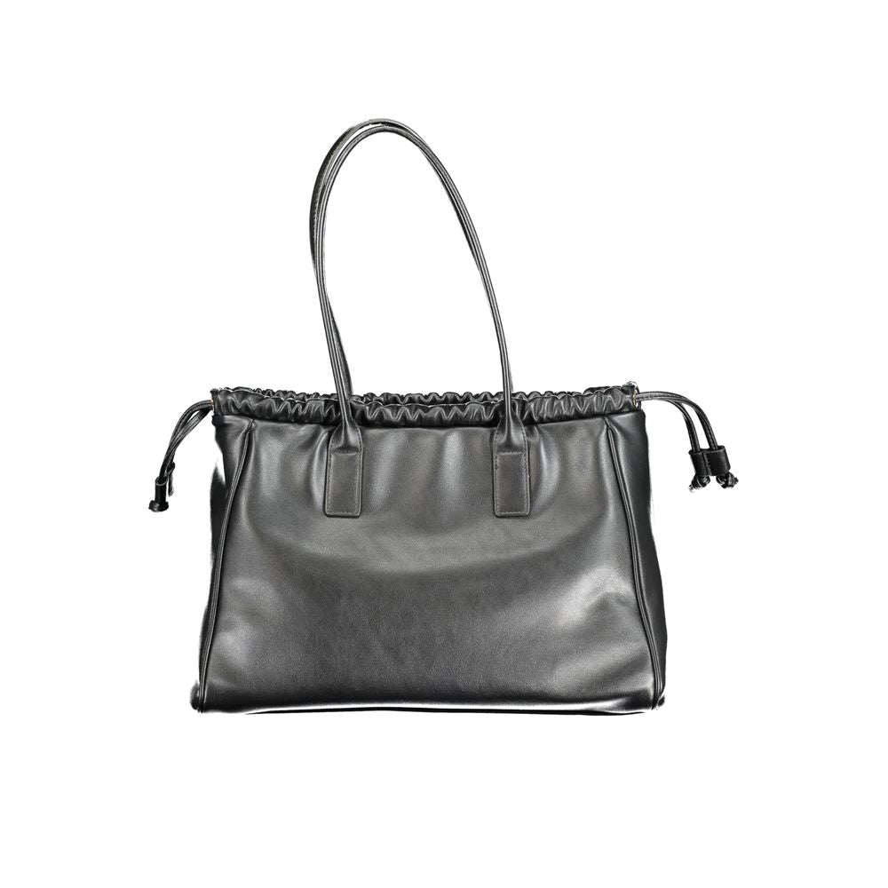 Front view with bag zipped and handles upright.