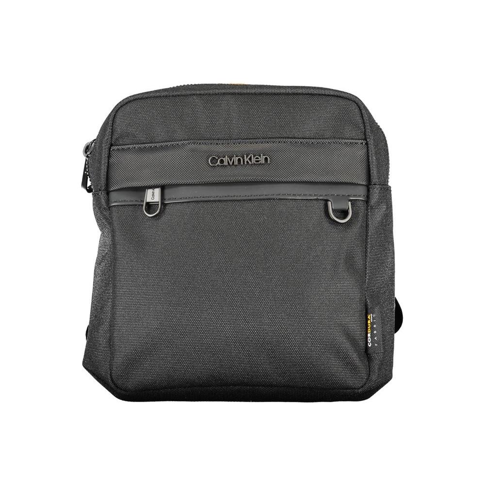 Front view with bag zipped and handles upright.