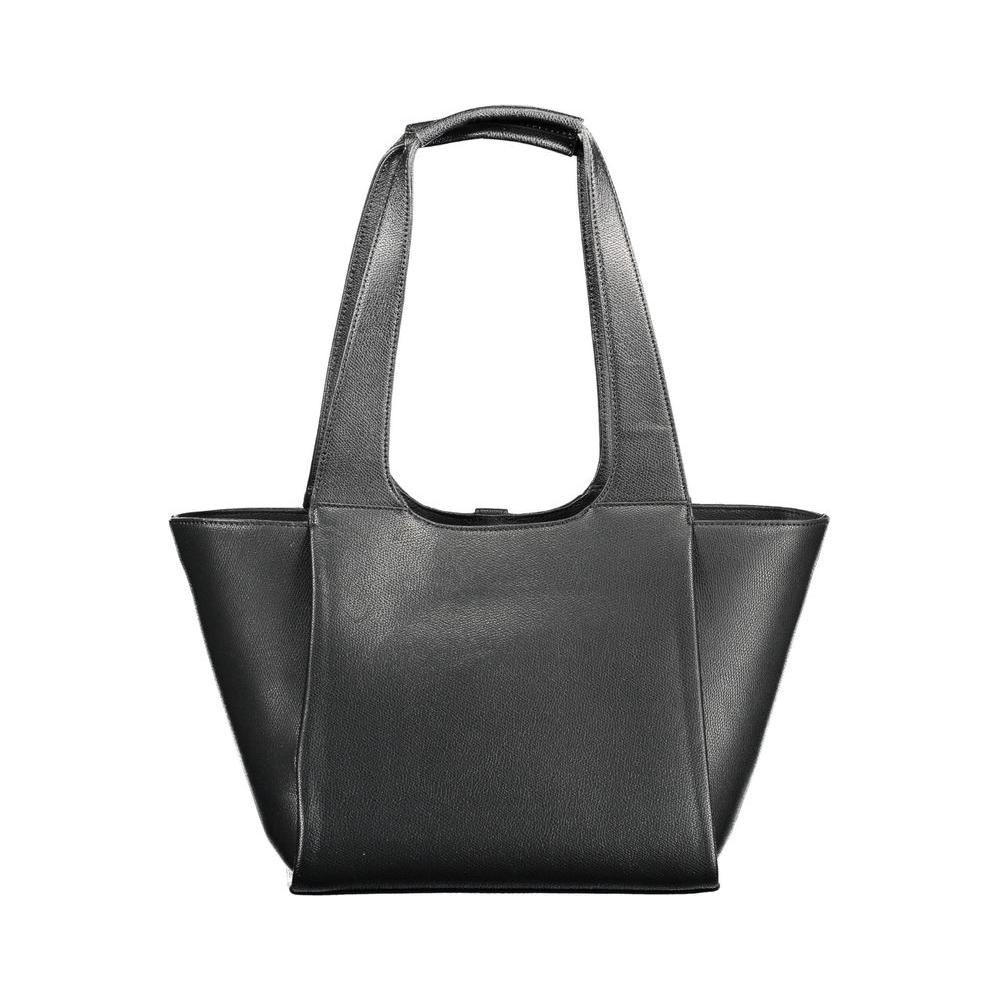Front view with bag zipped and handles upright.