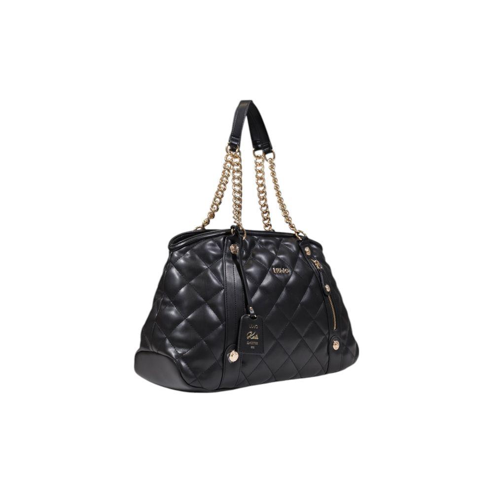 Front view with bag zipped and handles upright.