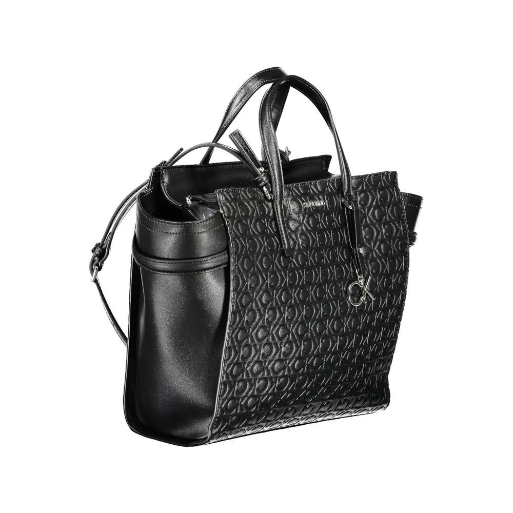 Front view with bag zipped and handles upright.