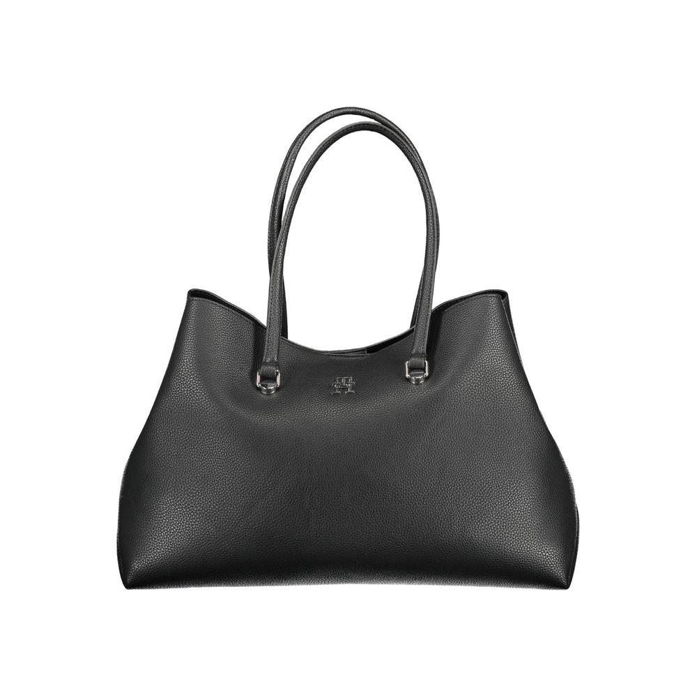 Front view with bag zipped and handles upright.