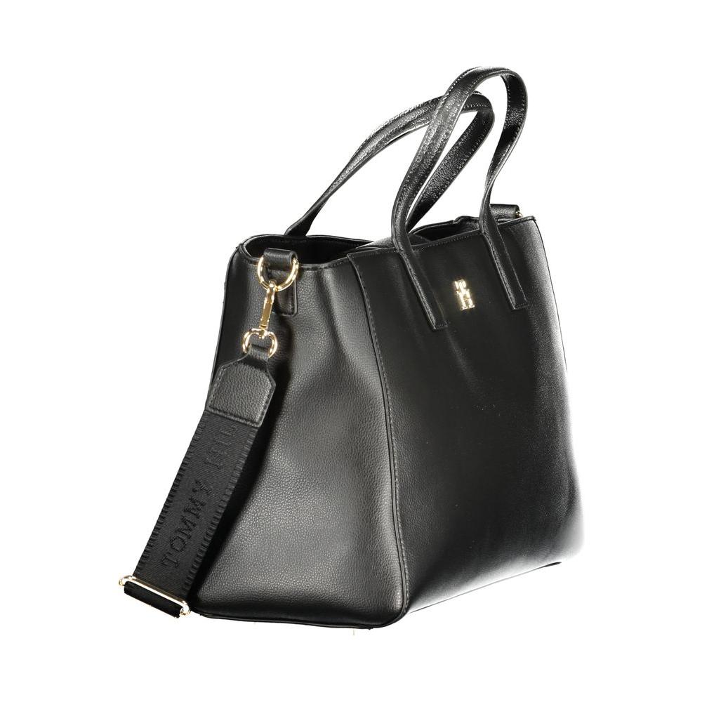 Front view with bag zipped and handles upright.