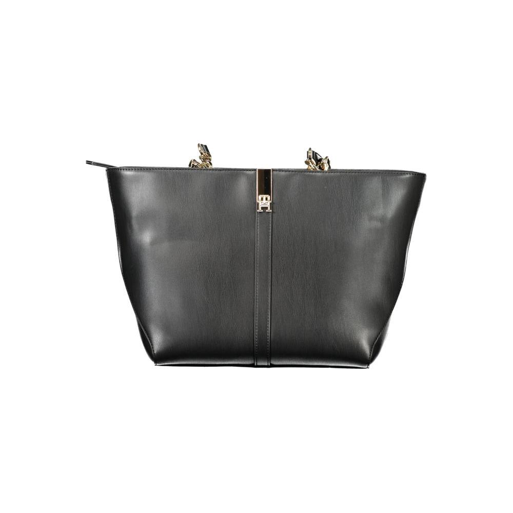 Front view with bag zipped and handles upright.