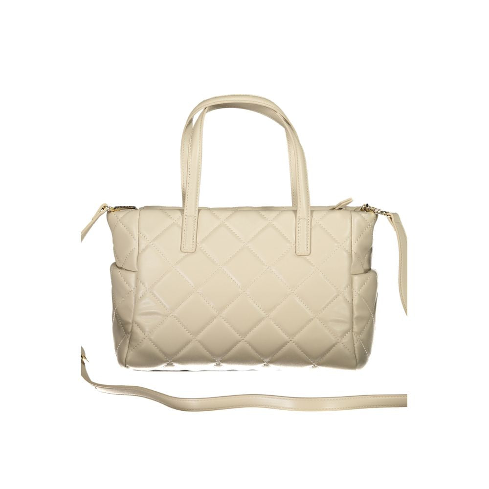 Front view with bag zipped and handles upright.