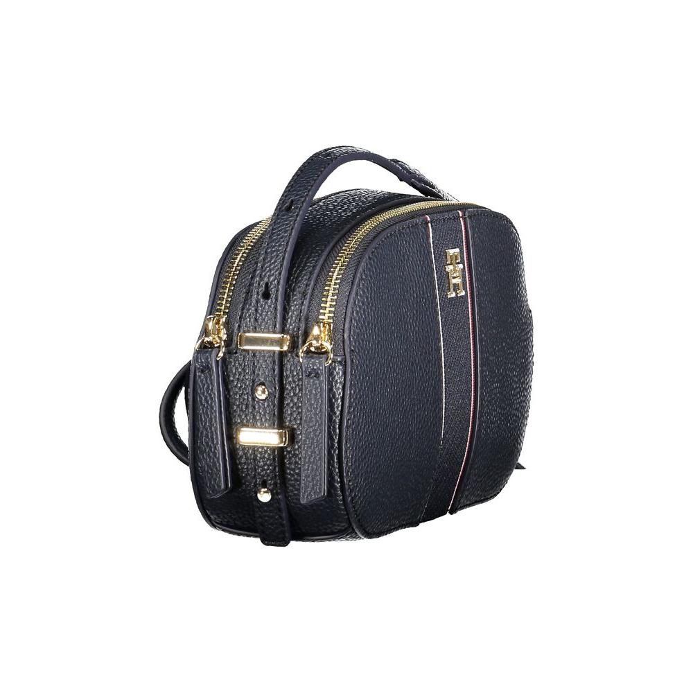Front view with bag zipped and handles upright.