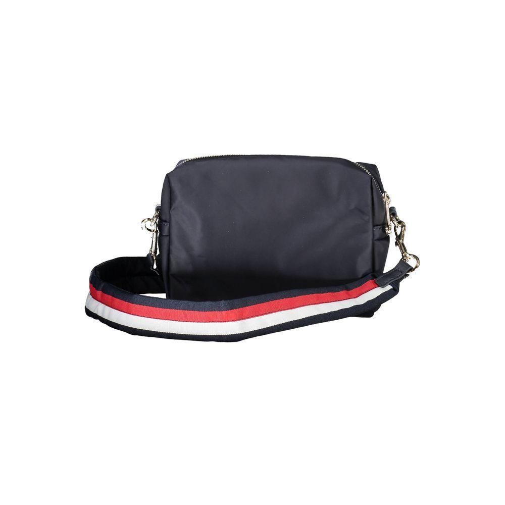 Front view with bag zipped and handles upright.