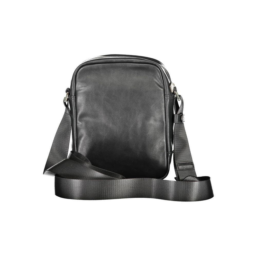 Front view with bag zipped and handles upright.