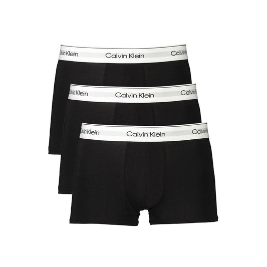 Calvin Klein black cotton men's boxer shorts tri-pack with logo waistband, low-waist design, 95% cotton and 5% elastane for comfort and fit.